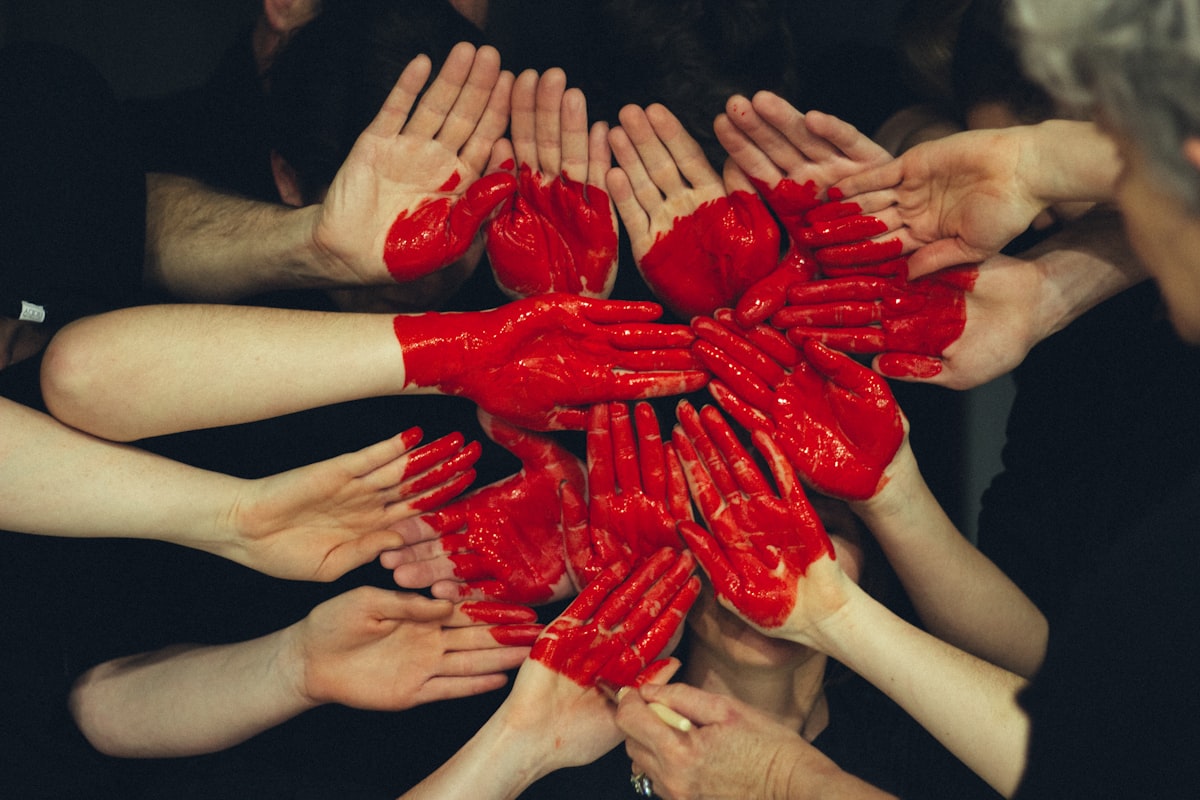 Community members joining hands