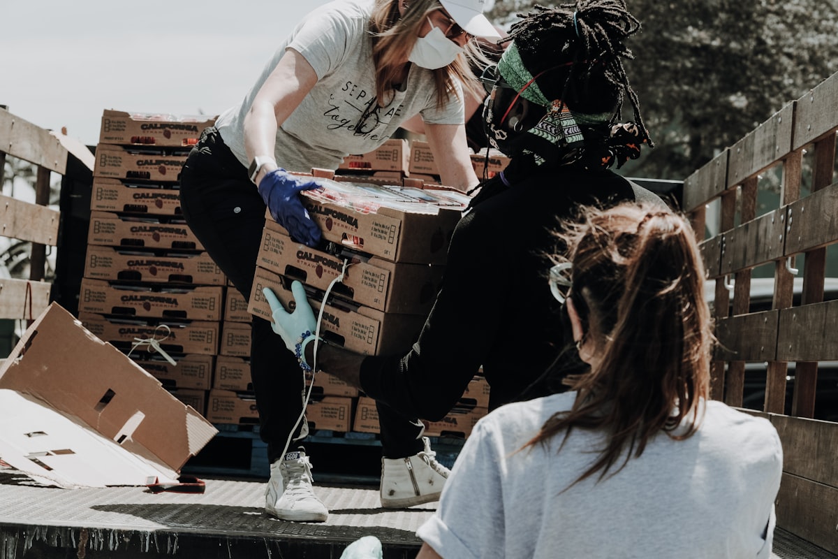 Volunteers packing food donations